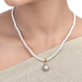 Karuna Wanaja Zircon Pendant Set