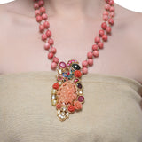 Samyukta Kundan Carved Pink Coral Floral Peacock Necklace Set